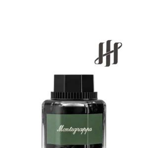 Flacon de cerneală Montegrappa Signature Black cu etichetă verde și capac negru, în recipient hexagonal din sticlă transparentă