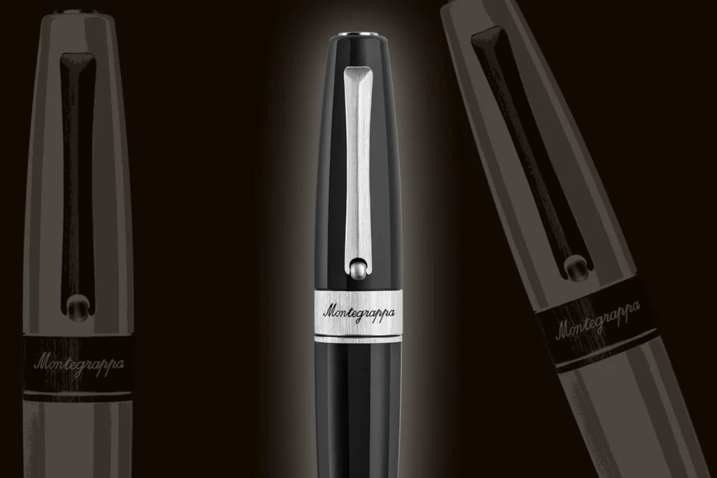 Stilou Magnifica Montegrappa cu finisaj negru lucios și detalii metalice, prezentat într-o compoziție elegantă pe fundal întunecat, Luxury Grand Store